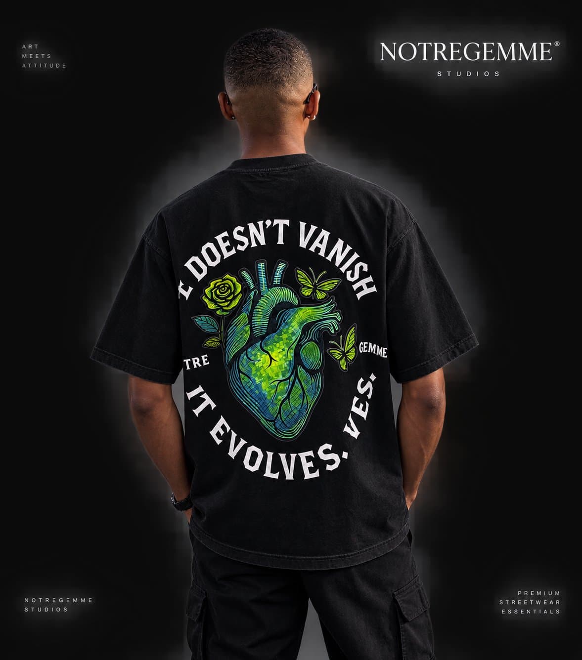Notre Gemme Evolution Tee — black tee, back view with anatomical heart, rose and butterflies inside 'Love Doesn't Vanish, It Evolves'