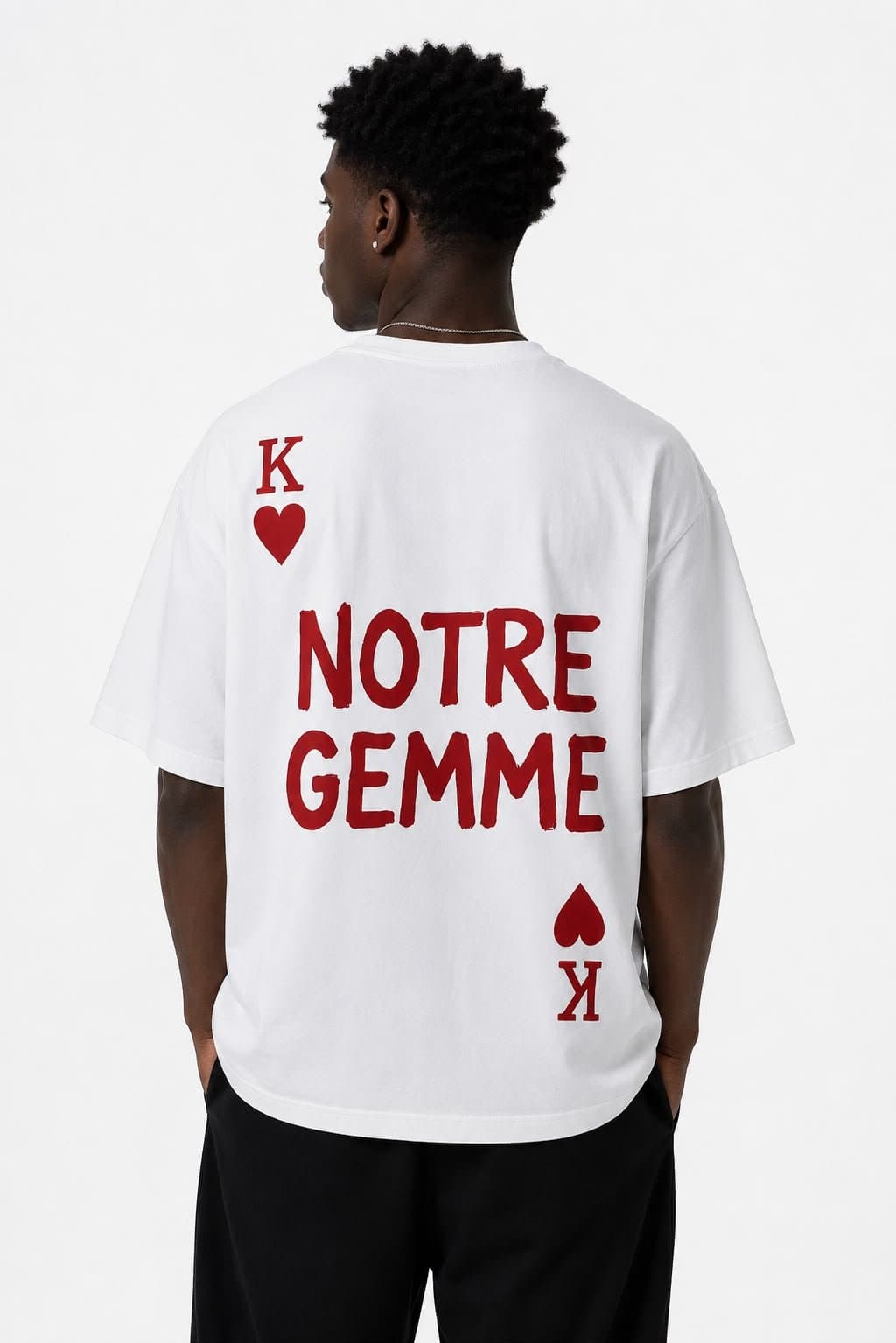 Notre Gemme King of Hearts Tee — white oversized tee, back view with red K♥ playing card and NOTRE GEMME print
